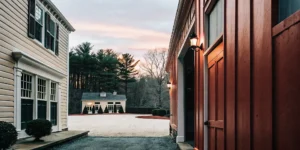 Private estate exterior with manicured grounds and stately architecture in New England