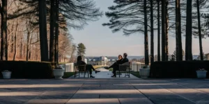A leadership team in a relaxed strategy session on the grounds of a private estate near Boston