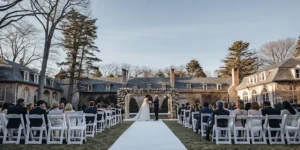 Elegant outdoor wedding ceremony on the manicured lawn of a private estate in Massachusetts